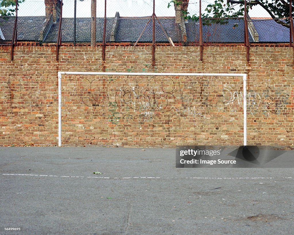 Football goal painted on wall