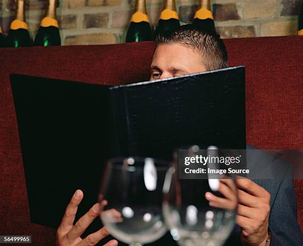 businessman in a restaurant - menu stock pictures, royalty-free photos & images