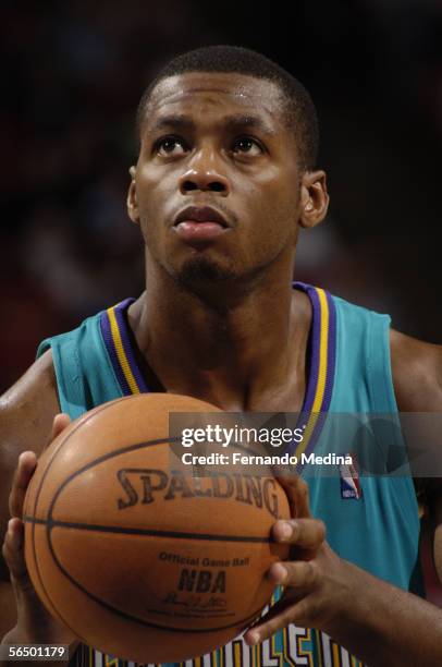 Desmond Mason of the New Orleans/Oklahoma City Hornets shoots a free throw against the Orlando Magic during a game at TD Waterhouse Centre on...