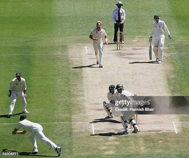 Ashwell Prince of South Africa and Adam Gilchrist of Australia look back to see Matthew Hayden of Australia take a catch to dismiss Prince during day...