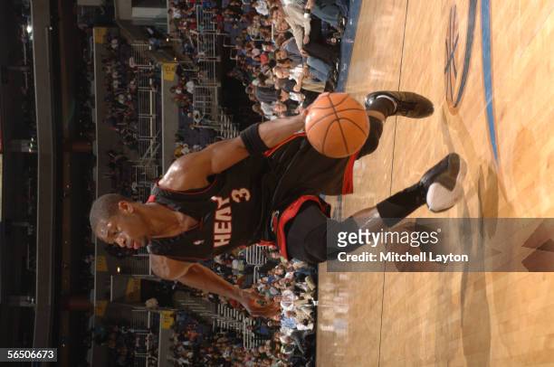 Dwyane Wade of the Miami Heat goes to the basket against the Washington Wizards on December 30, 2005 at the MCI Center in Washington, D.C. NOTE TO...