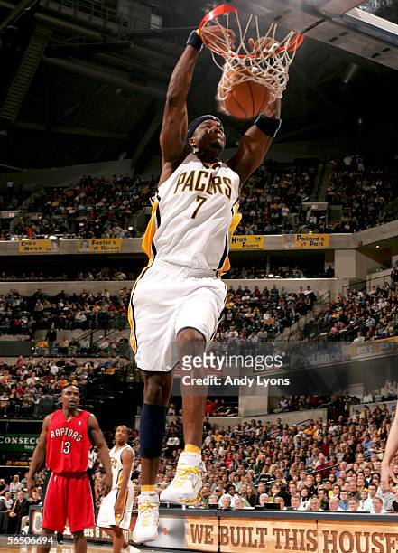 Jermaine O'Neal of the Indiana Pacers dunks the ball against the Toronto Raptors on December 30, 2005 at Conseco Fieldhouse in Indianapolis, Indiana....