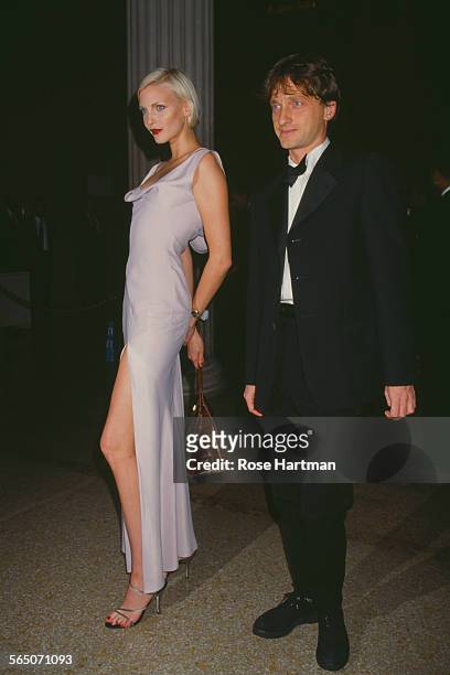 German model and actress, Nadja Auermann, attending a benefit held by the Costume Institute, with James Truman, 1994.