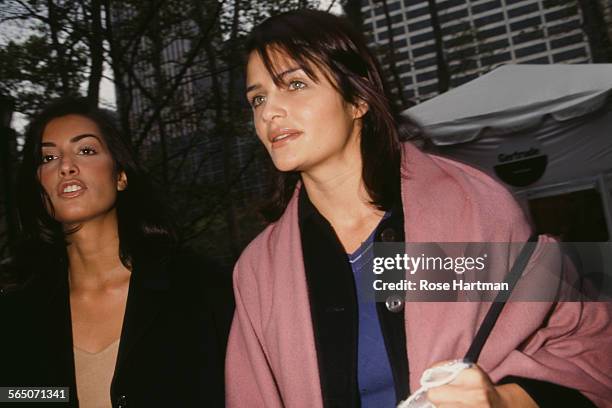 Canadian model, Yasmeen Ghauri , with Danish fashion model and photographer, Helena Christensen, New York City, circa 1995.