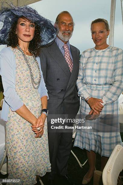 Prince and Princess Michael of Kent with American actress and model, Marisa Berenson at the Hampton Classic Horse Show, Bridgehampton, Long Island,...