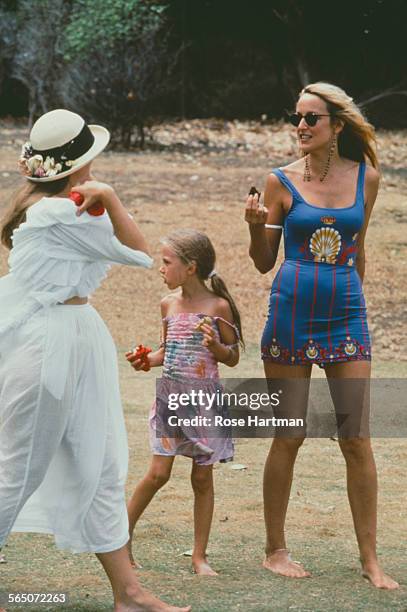 American model and actress Jerry Hall with her daughter Elizabeth Jagger, Mustique, circa 1991.