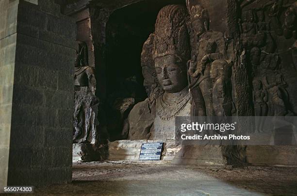 The Trimurti sculpture of Shiva as Creator, Preserver and Destroyer in the Elephanta Caves in Bombay Harbour, Bombay , India, circa 1965.