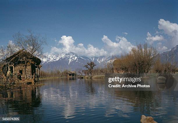 Huts on the shores of a lake in Kashmir, circa 1965.