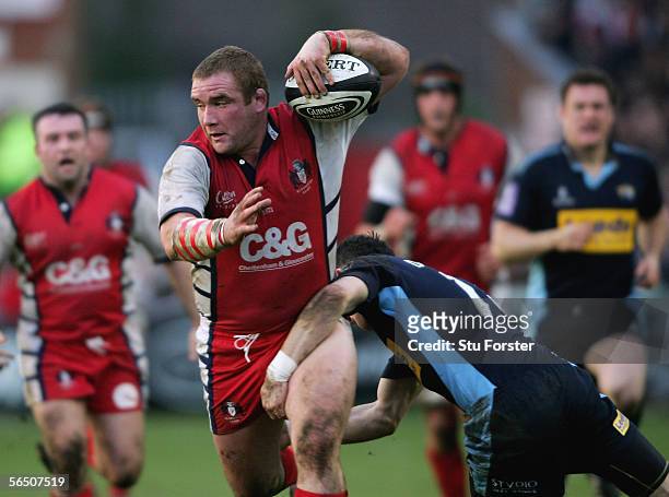 Gloucester forward Phil Vickery charges through the challenge of Gordon Ross of Leeds Tykes during the Guinness Premiership game between Gloucester...
