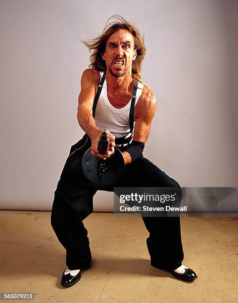 Iggy Pop poses for a studio portrait in Williamsburg, New York, United States, 21st May 2001.