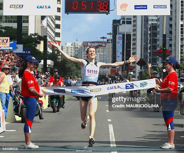 Serbian and Montenegro Olivera Jevtic jumps at the finishing line to win the 81st Sao Silvestre New Year s Eve road race, in Sao Paulo, Brazil, 31...