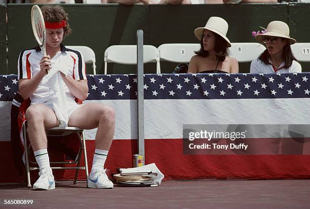 Two female spectators looking at John McEnroe of the United States during the Alan King Tennis Classic on 23 April 1979 at Las Vegas, Nevada, United...