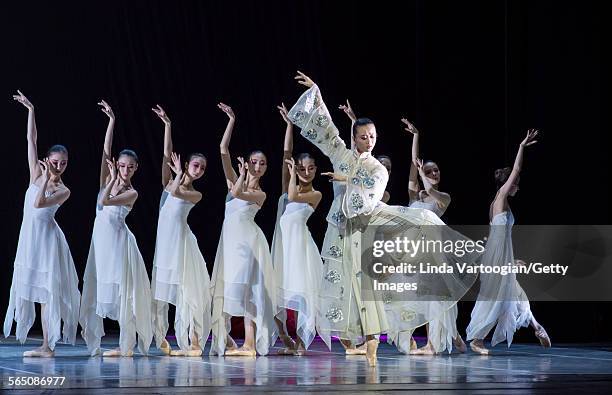 Along with the National Ballet of China ensemble, Chinese dancer Wang Qimin performs in the American premiere of the Ballet's production of 'The...