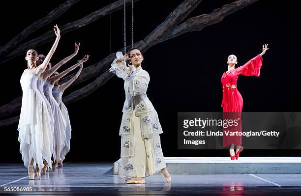 Along with the National Ballet of China ensemble, Chinese dancers Wang Qimin and Lu Na perform in the American premiere of the Ballet's production of...
