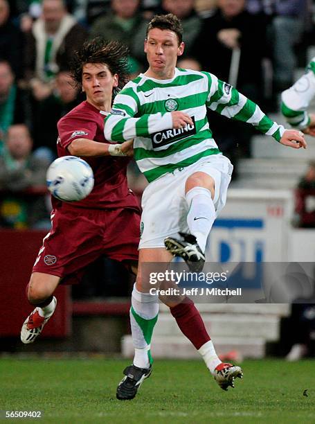 Hearts Deivdas Cesnauskis tackles Celtic's Alan Thompson during the Scottish Premier division match between Hearts and Celtic at Tynecastle stadium...