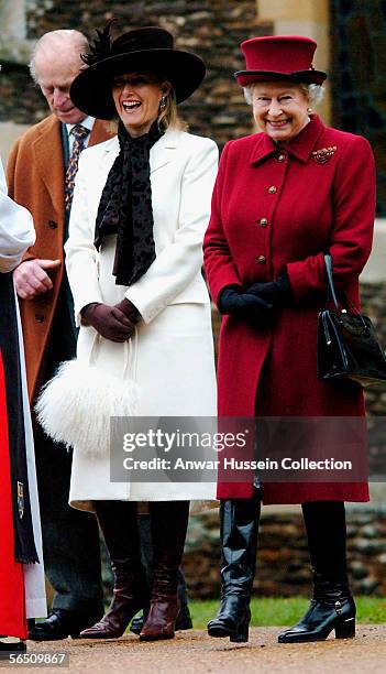 Britain's Queen Elizabeth II, smiles as she leaves St Mary Magdalene Church, alongside Sophie, Countess of Wessex and the Duke of Edinburgh on...