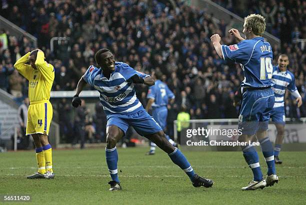 Ibrahima Sonko of Reading celebrates scoring their second goal during the Coca-Cola Championship match between Reading and Cardiff City at the...