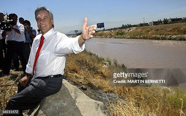 Rightist Chilean presidential candidate Sebastian Pinera speaks during a public gathering in the framework of his electoral campaign, in the banks of...
