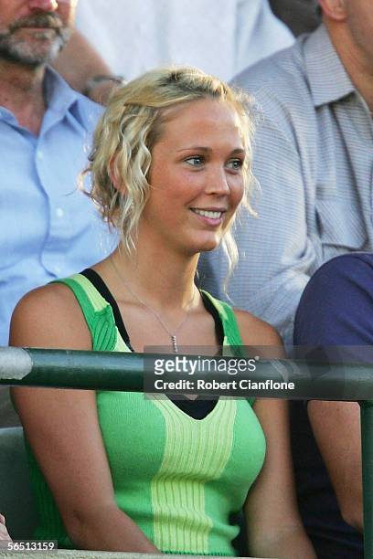 Bec Cartwright, wife of Lleyton Hewitt, watches on during his match against Jan Hernych of the Czech Republic on day two of the Next Generation Men's...