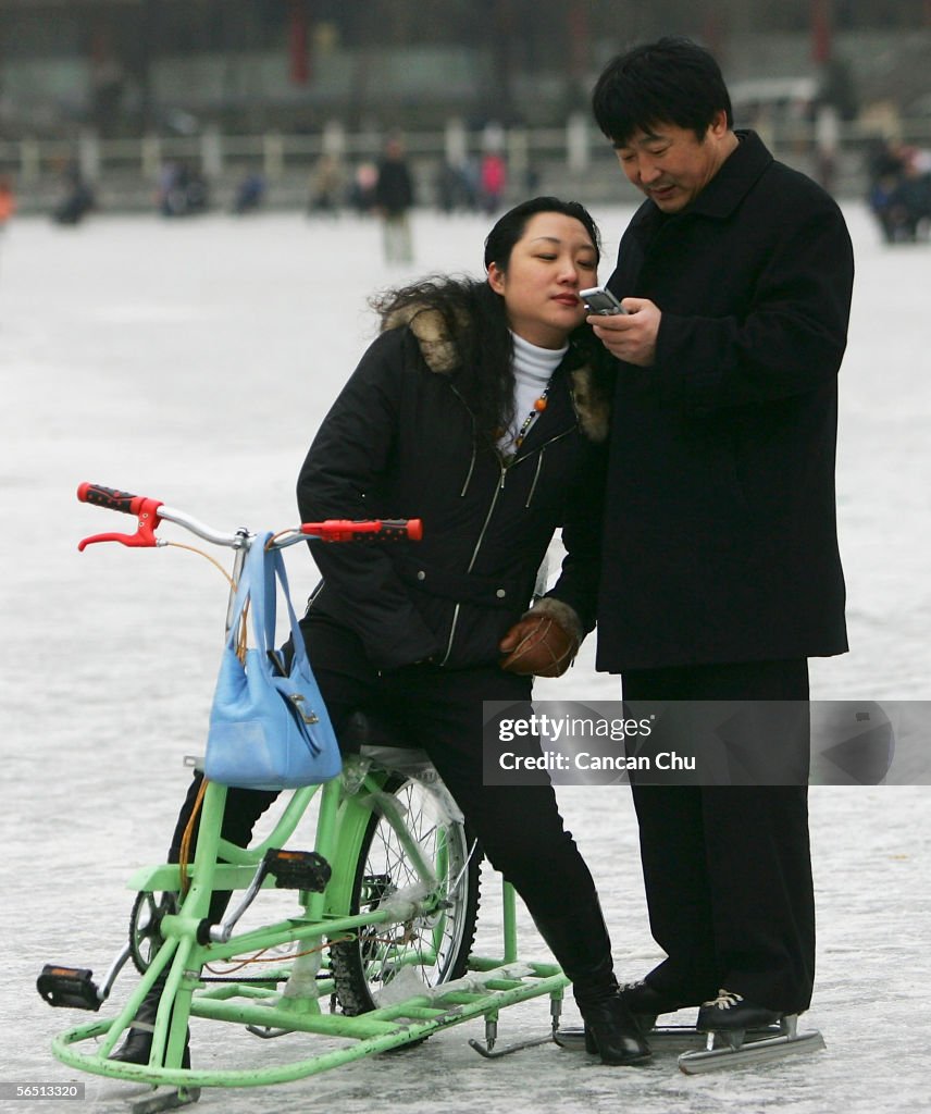 People Play On Frozen Shichahai Lake In Beijing