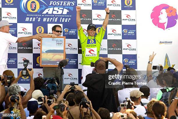 Andy Irons of US celebrates after winning his third Rip Curl Pro Pipeline Masters title on December 17, 2005 in Oahu, Hawaii.