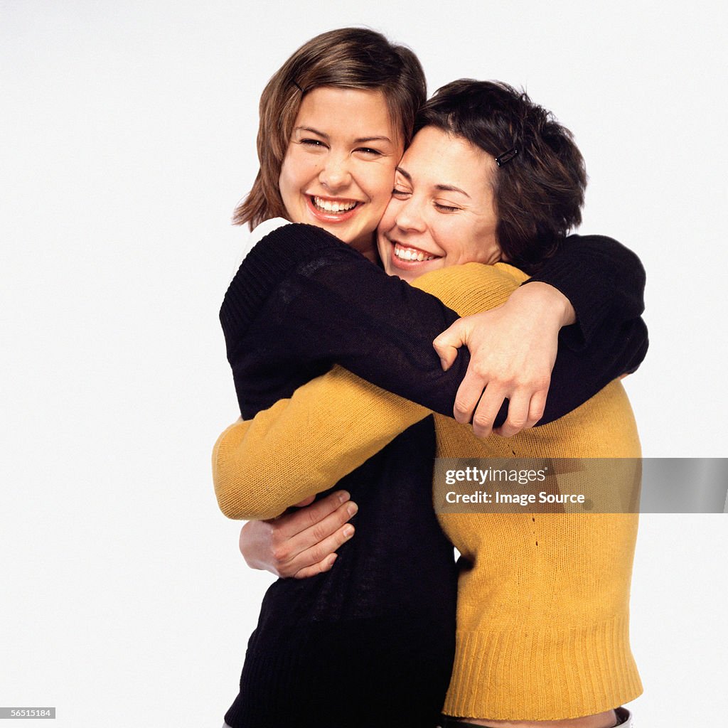 Female friends hugging