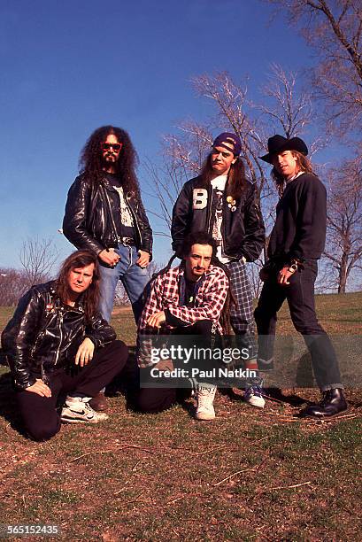 Portrait of the American band Faith No More, Chicago, Illinois, April 1, 1990. Pictured are, from row, from left Billy Gould and Mike Bordin; back...