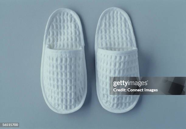 a pair of slippers - chinelos imagens e fotografias de stock