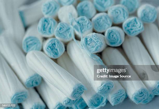 a pile of tampons - tampon stock pictures, royalty-free photos & images