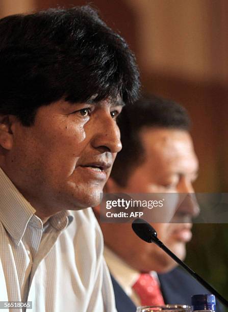 Bolivia's President-elect Evo Morales and his host, Venezuelan President Hugo Chavez offer a press conference 03 January, 2006 after a ceremony held...