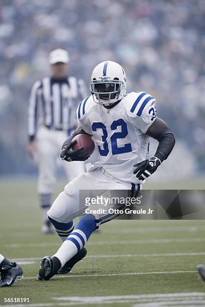 Running back Edgerrin James of the Indianapolis Colts carries the ball against the Seattle Seahawks at Qwest Field on December 24, 2005 in Seattle,...