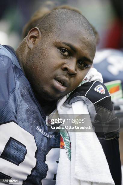 Defensive tackle Rocky Bernard of the Seattle Seahawks looks on against the Indianapolis Colts at Qwest Field on December 24, 2005 in Seattle,...