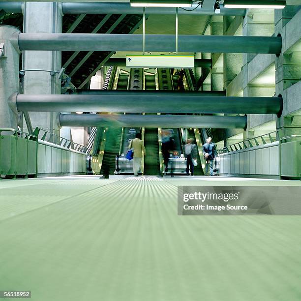 commuters in large subway station - westminster square stock pictures, royalty-free photos & images