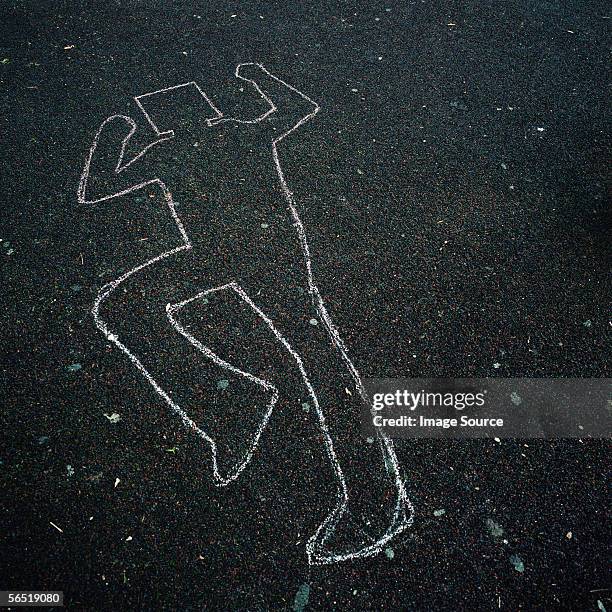 chalk outline on floor - body line stockfoto's en -beelden