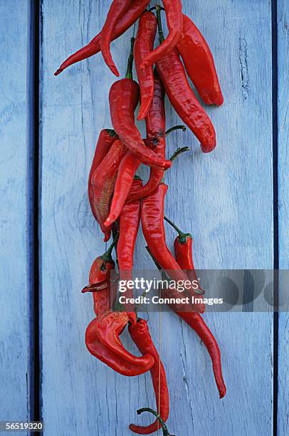 red peppers drying - chilli flakes stock pictures, royalty-free photos & images
