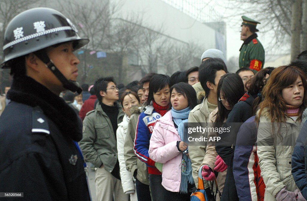 Police (L) and paramilitary police keep