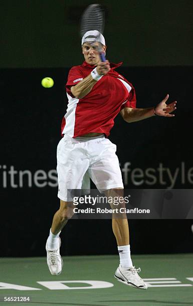Andreas Seppi of Italy hits a forehand against James Blake of the USA on day three of the Next Generation Men's Hardcourts at Memorial Drive on...
