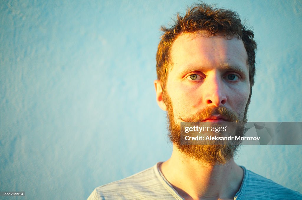 Portrait of serious man with beard