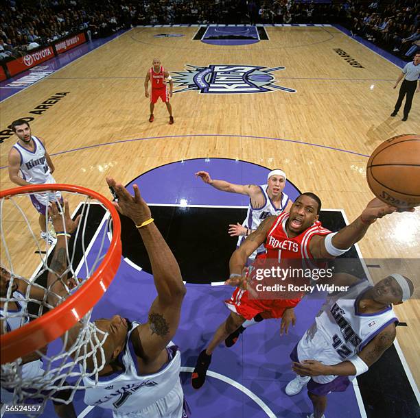 Tracy McGrady of the Houston Rockets shoots against the Sacramento Kings during the game at the Arco Arena on December 8, 2008 in Sacramento,...