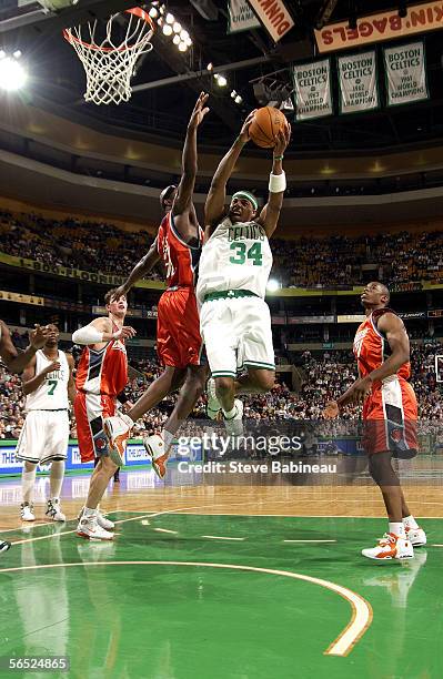 Paul Pierce of the Boston Celtics goes to the basket against Jumaine Jones of the Charlotte Bobcats on January 4, 2006 at the TD Banknorth Garden in...