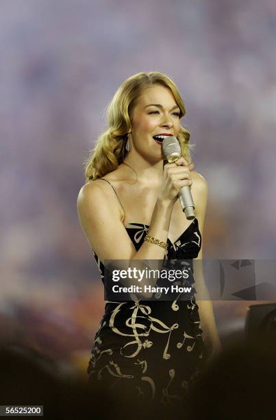 Singer Leann Rimes sings the national anthem before the start of the BCS National Championship Rose Bowl Game between the USC Trojans and the Texas...