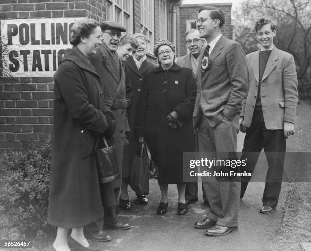 Schoolteacher and Labour candidate Merlyn Rees , chatting to voters outside a polling station in East Harrow, 19th March 1959.