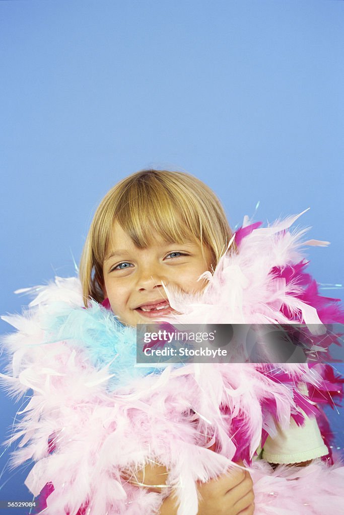 Portrait of a girl wearing a feather boa