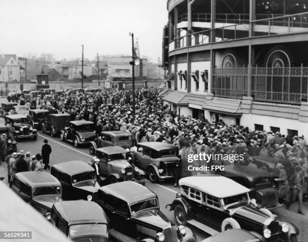 View of the chaos outside Wrigley Field the day tickets go on sale for the World Series between the hometown Chicago Cubs and the Detroit Tigers as...