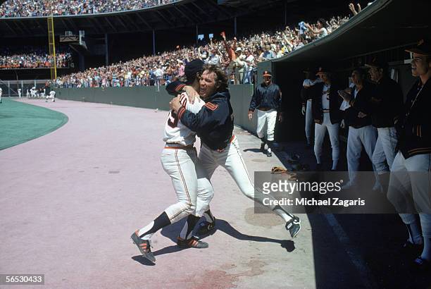 Pitcher John Montefusco of the San Fransico Giants celebrates with teammate Mike Ivie after his grand slam during a 1978 season game. John Montefusco...