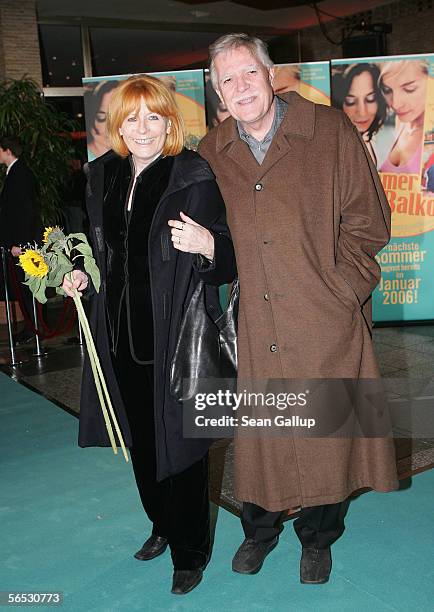 German cinematographer Michael Ballhaus arrives with his wife Helga for the premiere of the new German comedy film "Sommer vorm Balcon" January 5,...