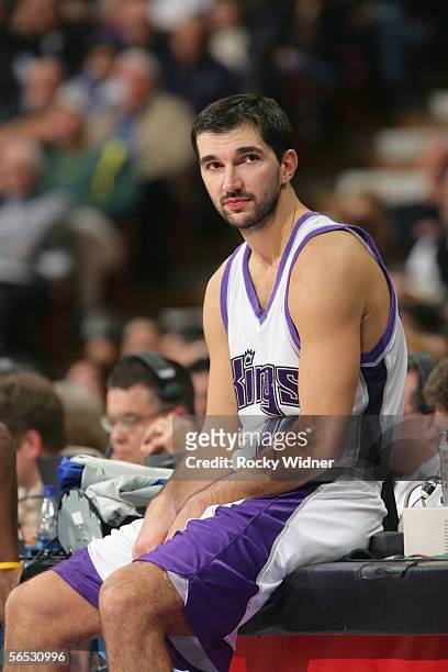 Predrag Stojakovic of the Sacramento Kings waits to enter the game during the game against the New Orleans/Oklahoma City Hornets at Arco Arena on...