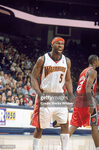 Baron Davis of the Golden State Warriors yells on the court after a play against the Charlotte Bobcats at The Arena in Oakland on December 2, 2005 in...