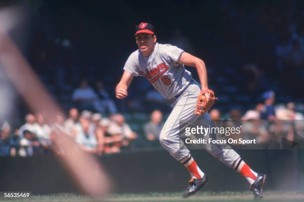 Brooks Robinson of the Baltimore Orioles runs to field a ball during a game at Memorial Stadium circa the 1970's in Baltimore, Maryland.