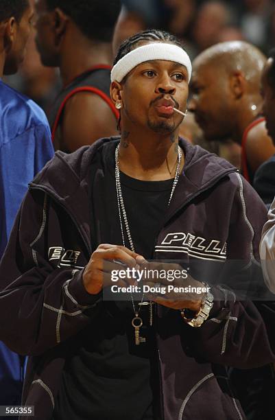 Guard Allen Iverson of the Philadelphia 76ers sucks on a lollipop during the NBA game against the Washington Wizards at MCI Center in Washington,...